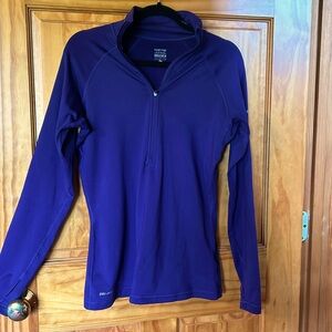 Nike dri-fit, quarter zip pullover in purplish blue color